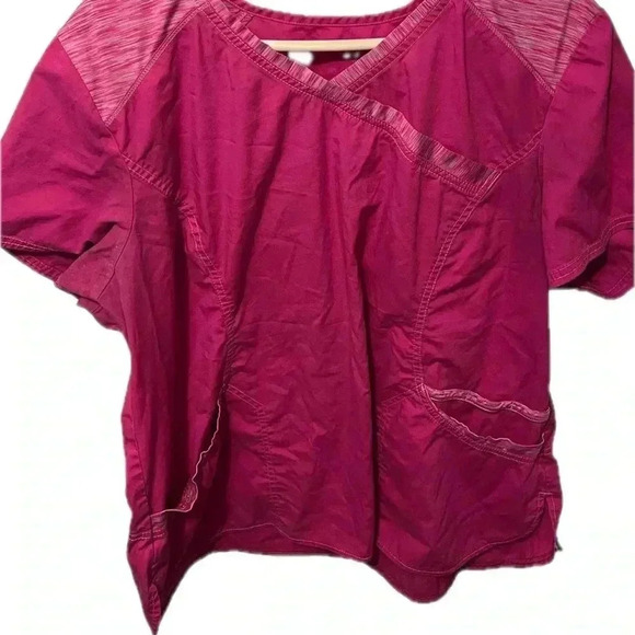 Slightly worn pink scrub top - Picture 1 of 4